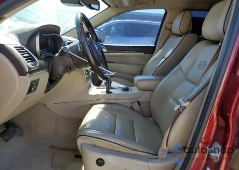 2014 Jeep Grand Cherokee Overland z USA, uszkodzony, nr VIN 1C4RJFCM2EC324174